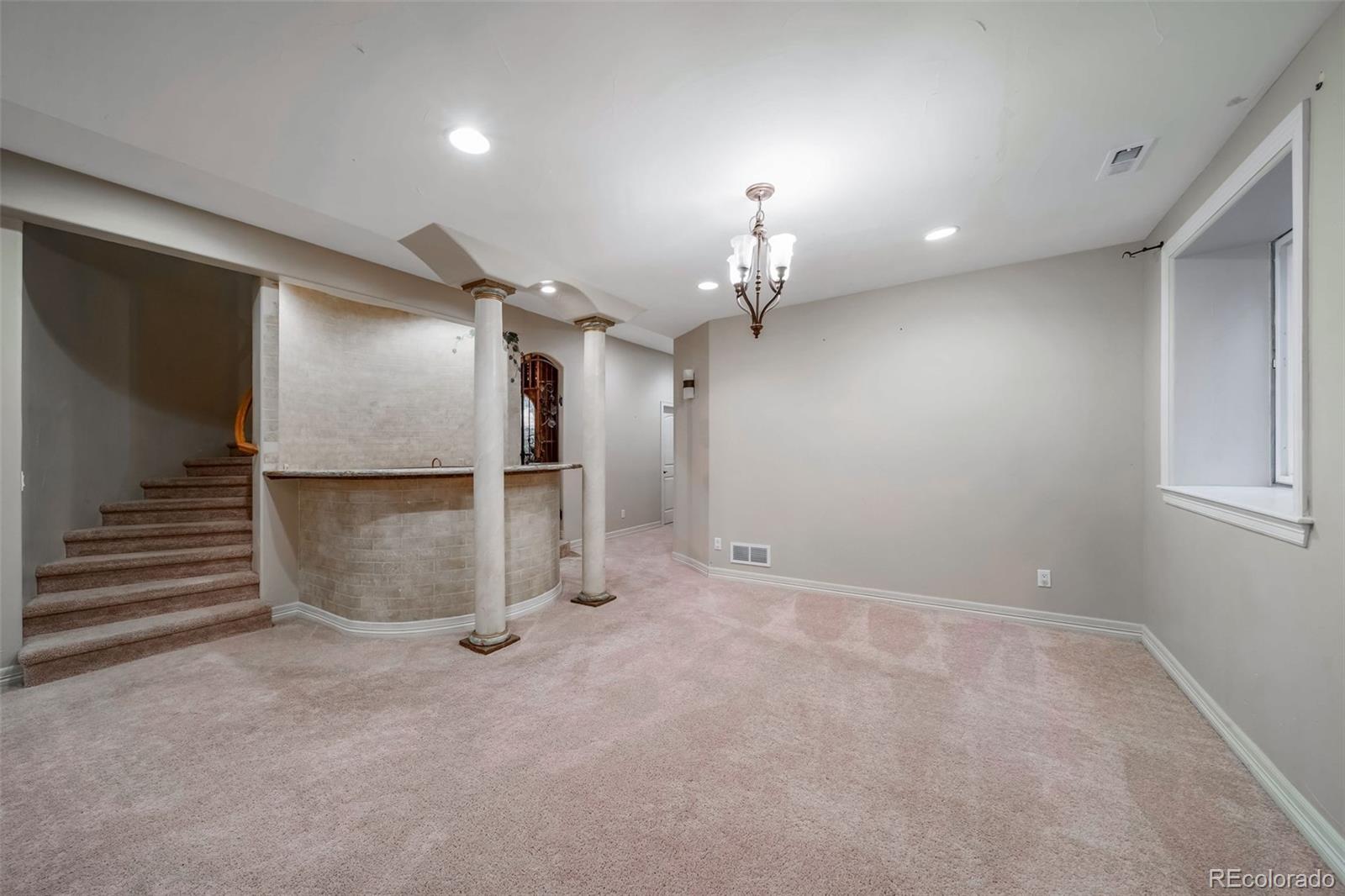 1425 South Elizabeth Street Denver, CO 80210 - Photo 33 of 50 wooden floor in an empty room with a window