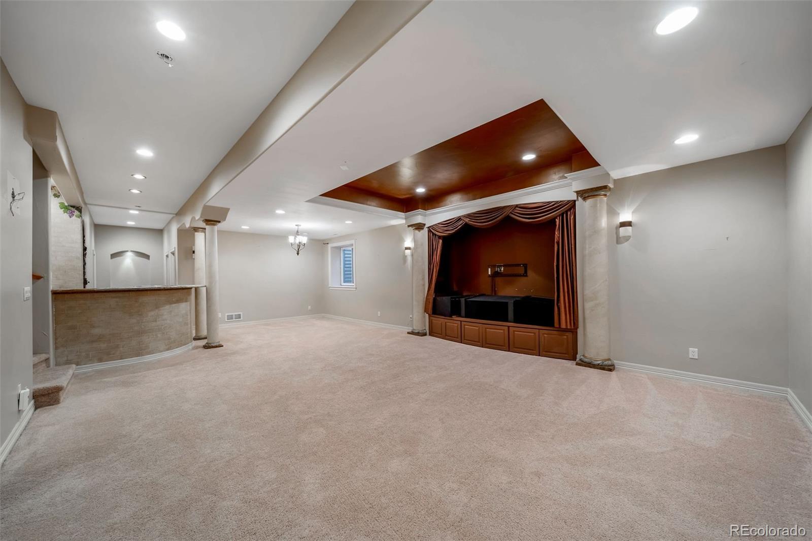 1425 South Elizabeth Street Denver, CO 80210 - Photo 34 of 50 a view of an empty room with a fireplace