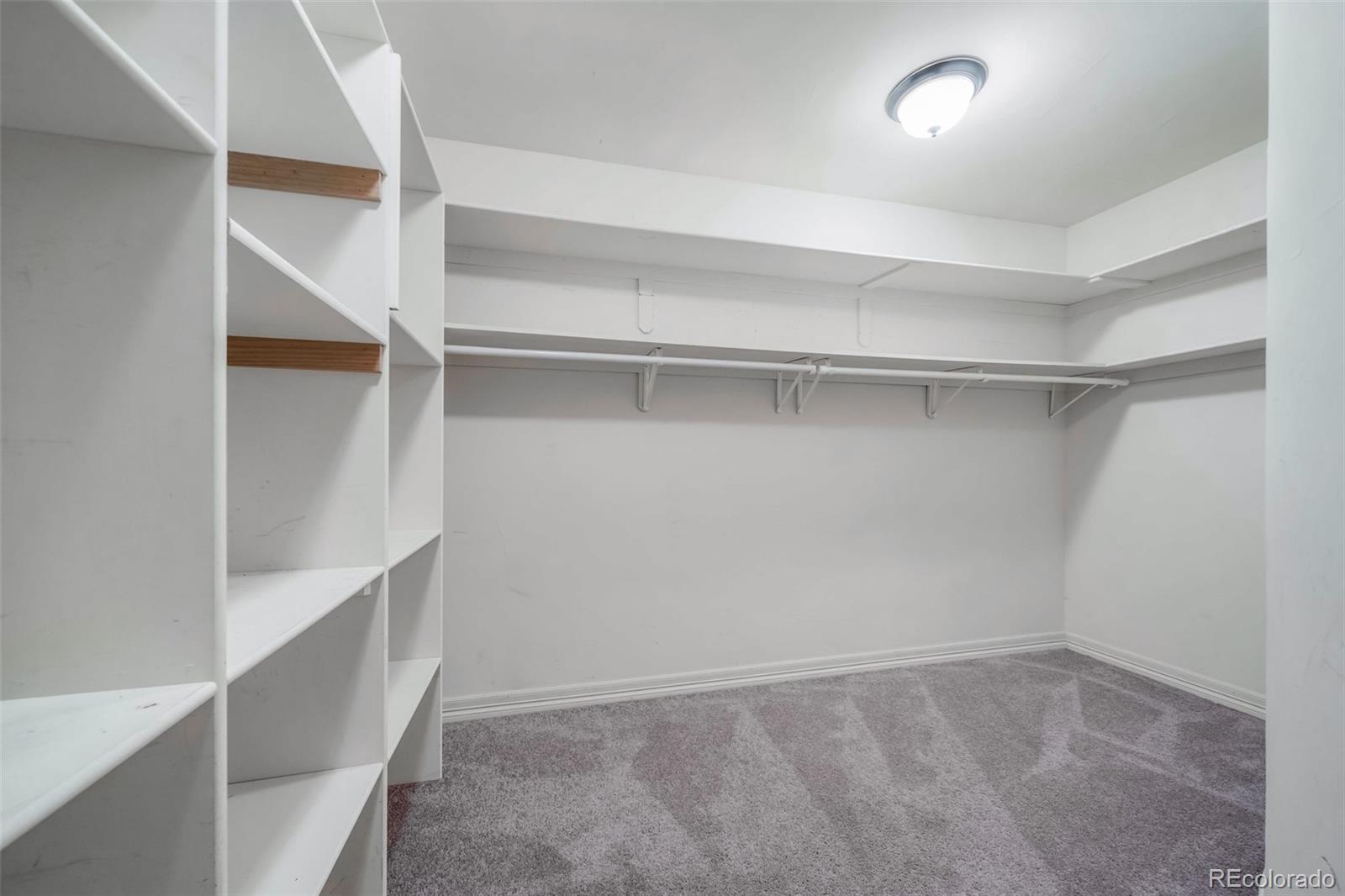 1425 South Elizabeth Street Denver, CO 80210 - Photo 38 of 50 a view of an empty walk in closet