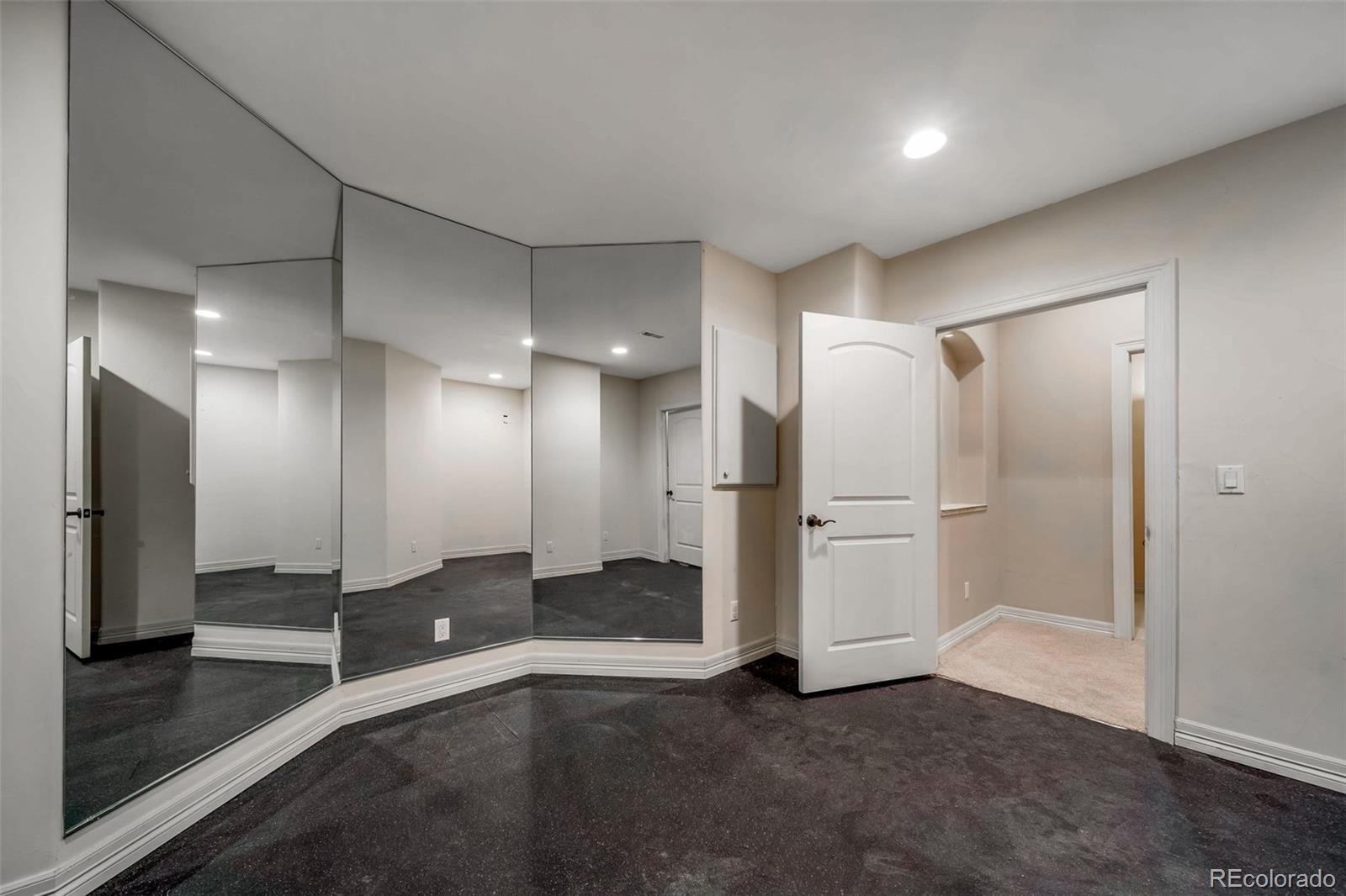 1425 South Elizabeth Street Denver, CO 80210 - Photo 40 of 50 a view of a hallway with stainless steel appliances