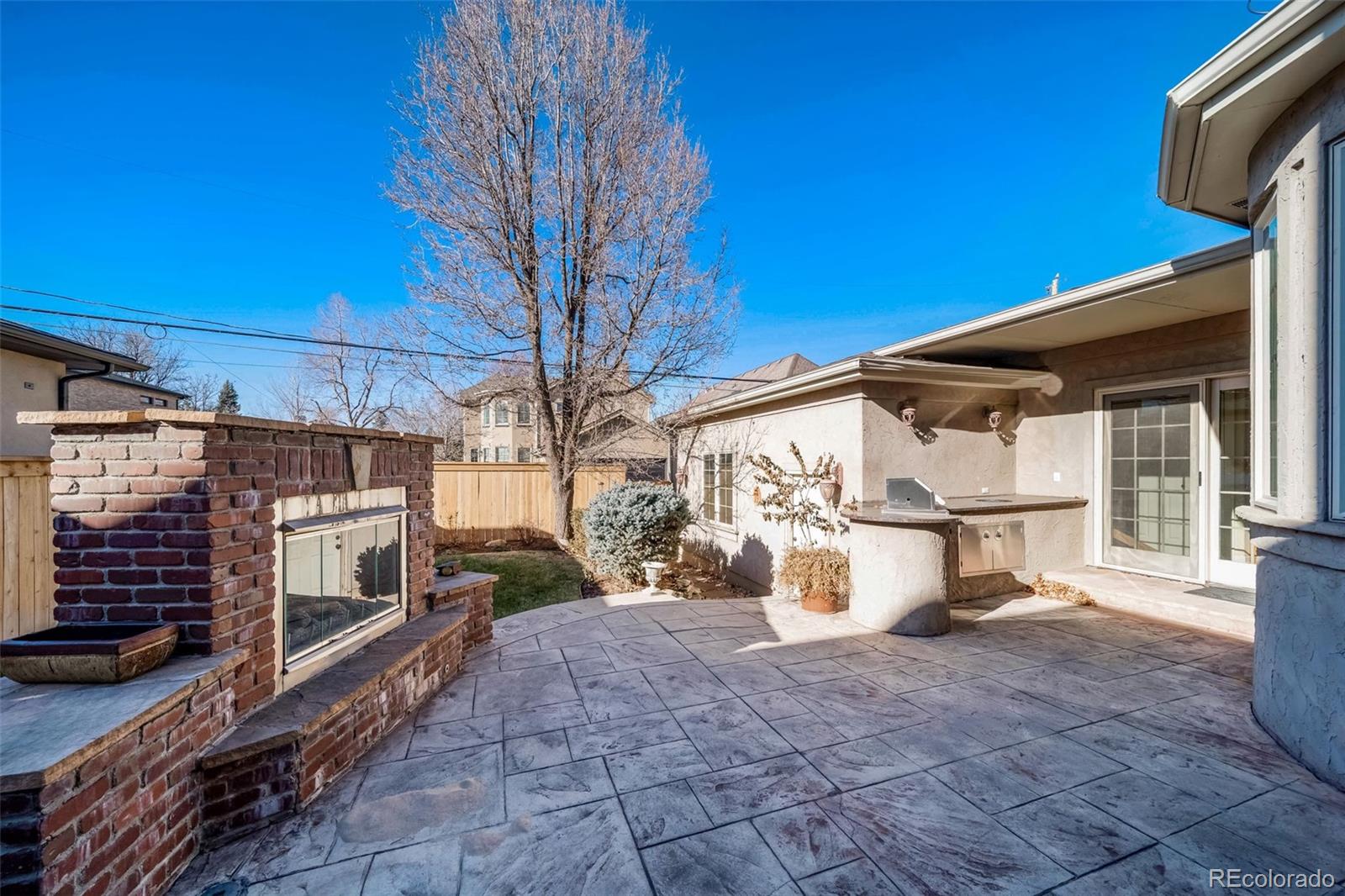 1425 South Elizabeth Street Denver, CO 80210 - Photo 41 of 50 a view of a back yard with a tv