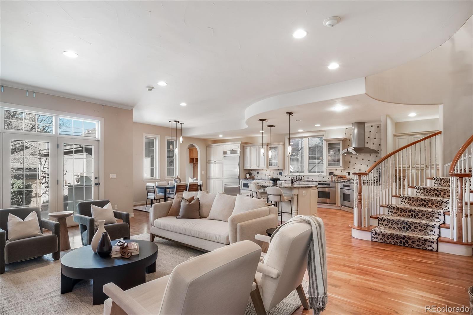 1425 South Elizabeth Street Denver, CO 80210 - Photo 7 of 50 a living room with furniture kitchen view and a large window