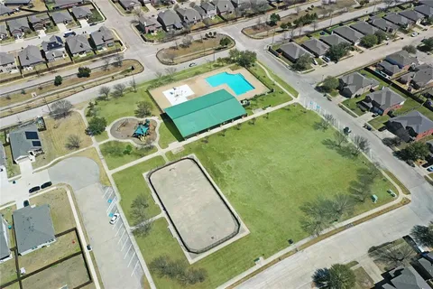 an aerial view of a pool