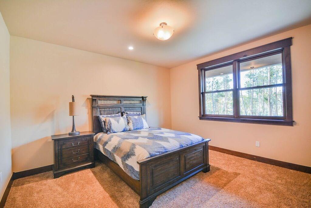 698 Independence Road, Unit 7A Keystone, CO 80435 - Photo 13 of 25 a bedroom with a bed and window