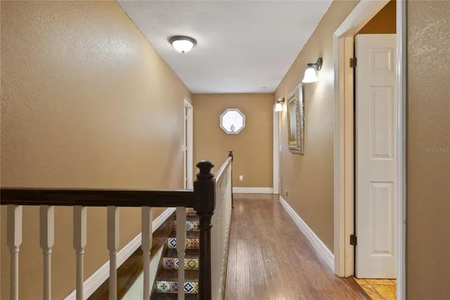 a view of entryway with wooden floor