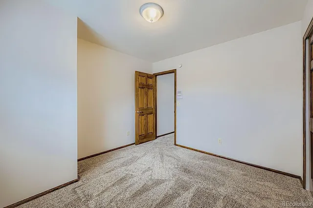 an empty room with window