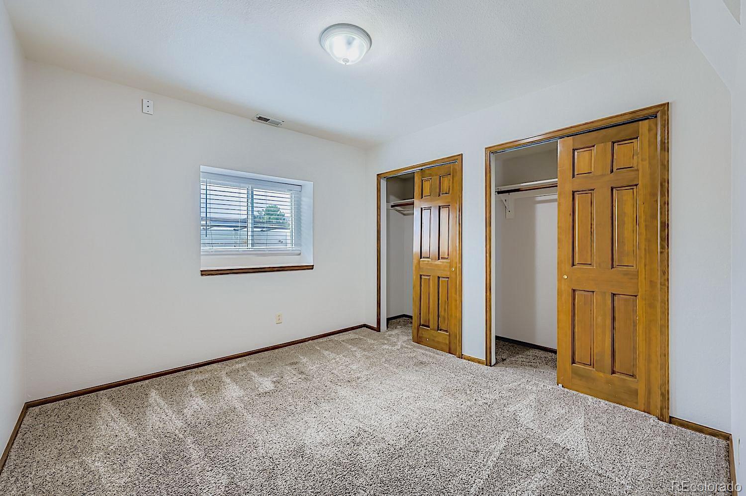 5825 Wilson Road Colorado Springs, CO 80919 - Photo 38 of 50 an empty room with window