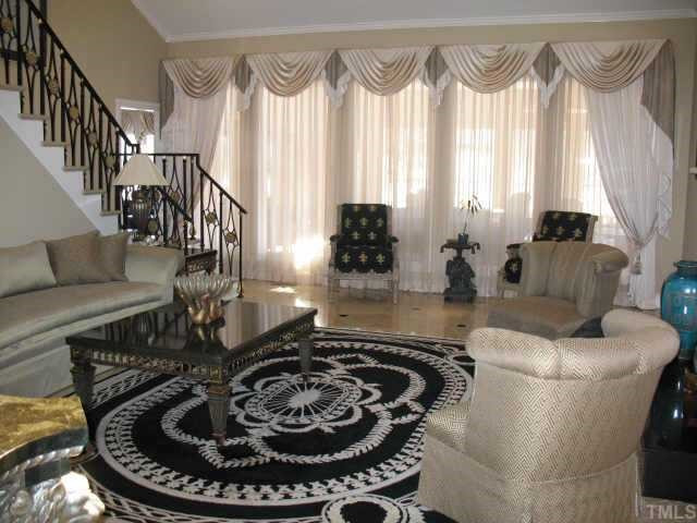 1608 Quaker Ridge Point Raleigh, NC 27615 - Photo 2 of 10 Two story family room has wet bar, wine cooler and fireplace. Other