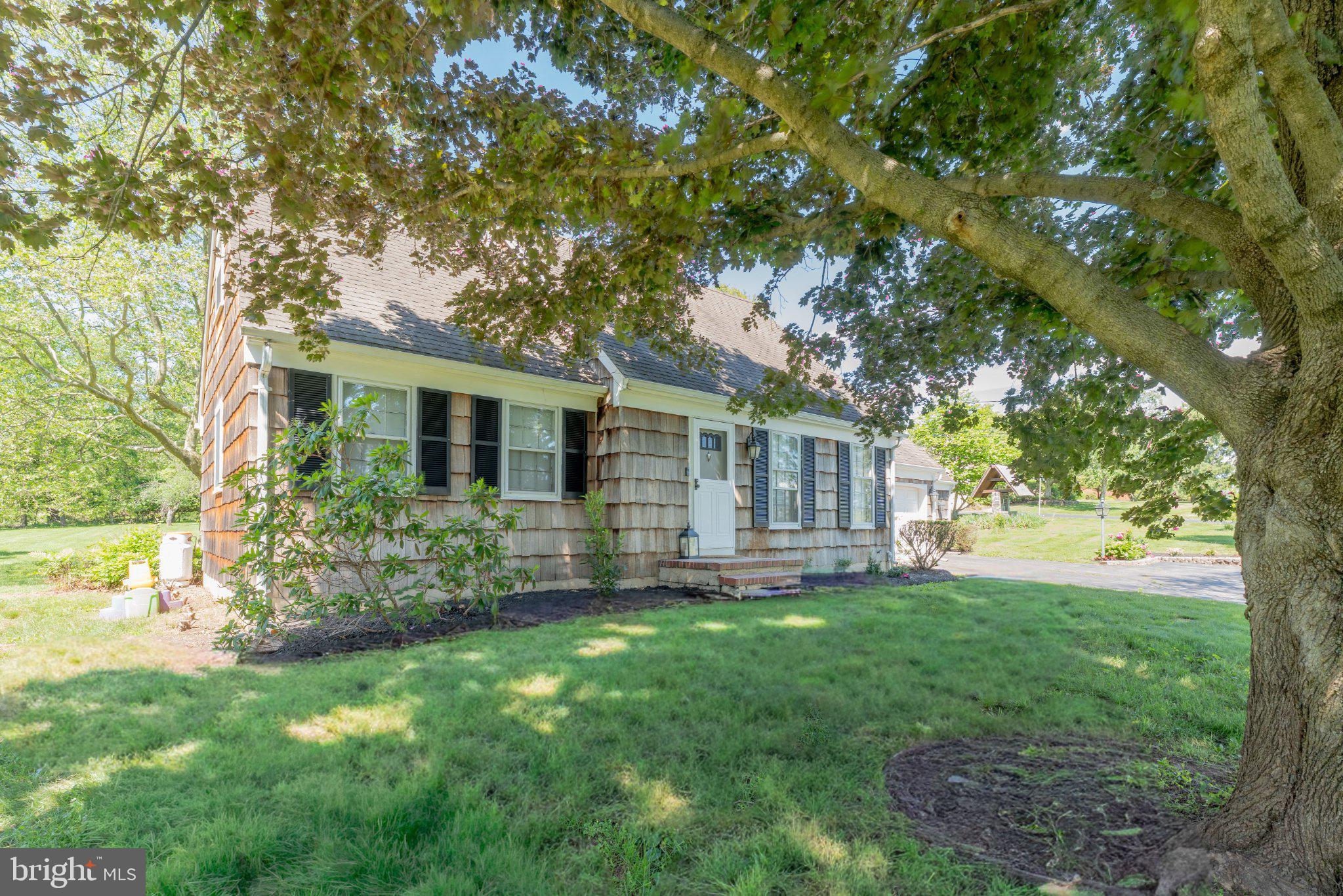69 Manners Road Ringoes, NJ 08551 - Photo 4 of 42 Charming home nestled in lush greenery.