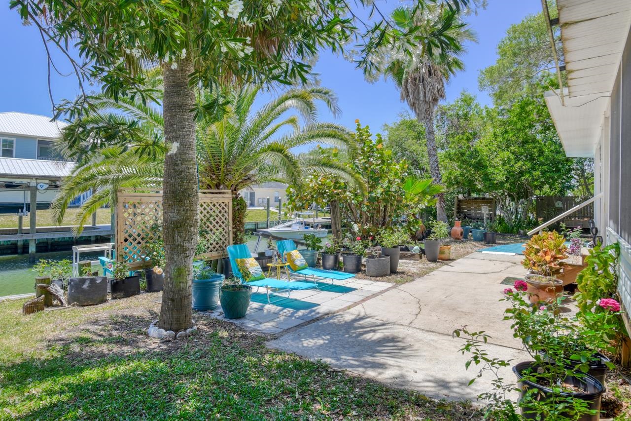 231 Hildago Road St. Augustine, FL 32080 - Photo 11 of 49 a backyard of a house with lots of green space