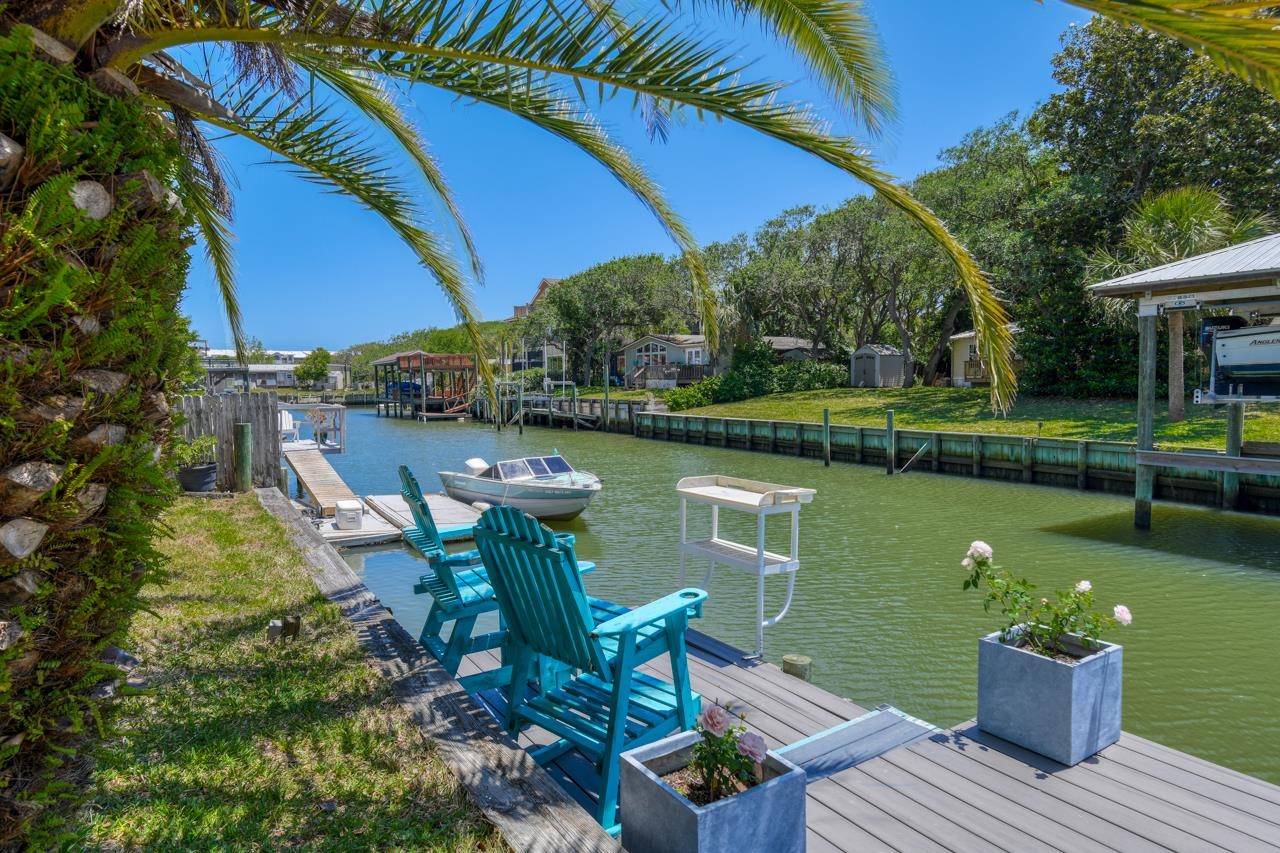 231 Hildago Road St. Augustine, FL 32080 - Photo 13 of 49 a view of a lake with a patio