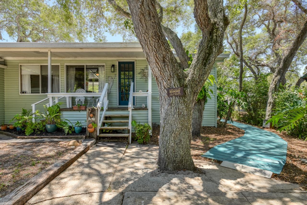 231 Hildago Road St. Augustine, FL 32080 - Photo 6 of 49 a front view of a house with garden