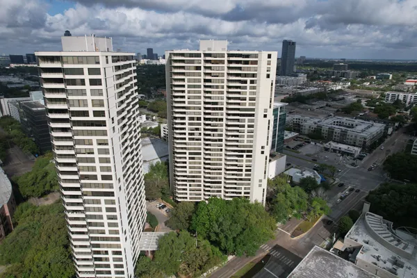 a view of a city with tall buildings