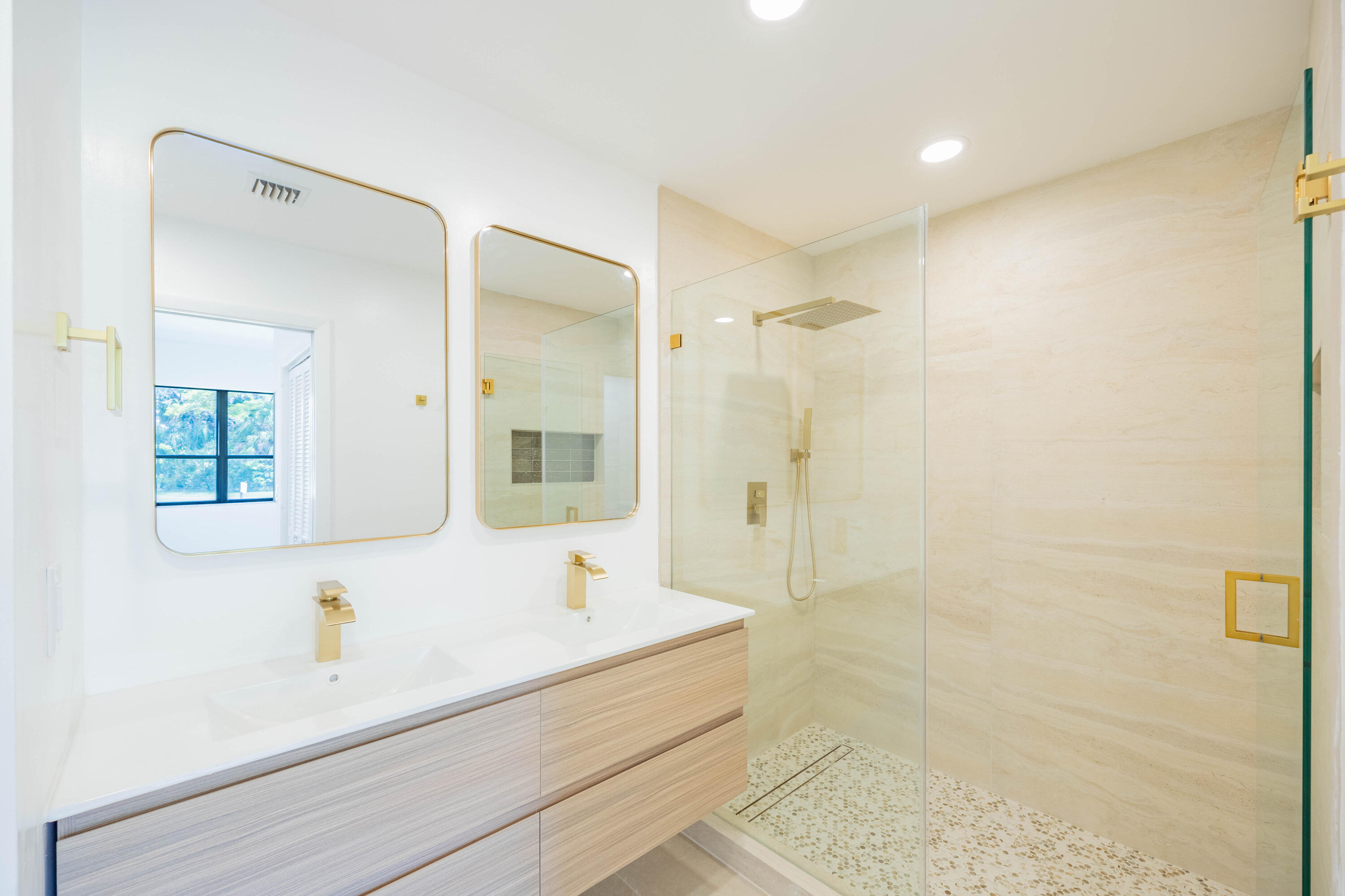 7520 La Paz Boulevard, Unit 104 Boca Raton, FL 33433 - Photo 30 of 56 a bathroom with a bathtub and a sink
