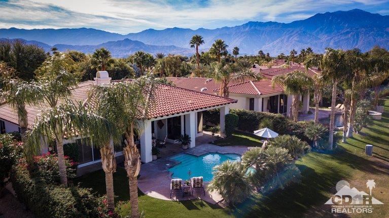 265 Loch Lomond Road Rancho Mirage, CA 92270 - Photo 1 of 46 an aerial view of a house with a yard