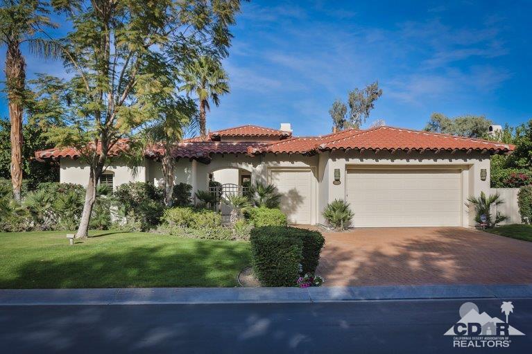 265 Loch Lomond Road Rancho Mirage, CA 92270 - Photo 2 of 46 a front view of a house with a yard