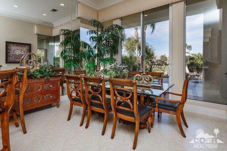 265 Loch Lomond Road Rancho Mirage, CA 92270 - Photo 13 of 46 a view of a dining room with furniture and chandelier