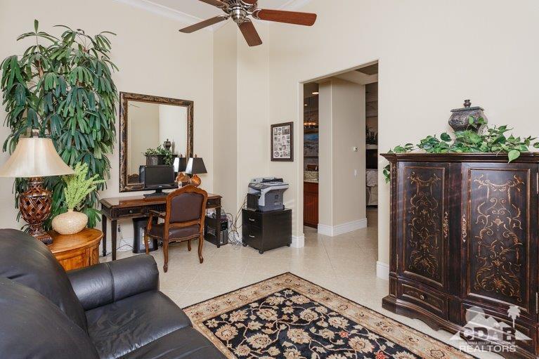 265 Loch Lomond Road Rancho Mirage, CA 92270 - Photo 24 of 46 a living room with furniture and a potted plant