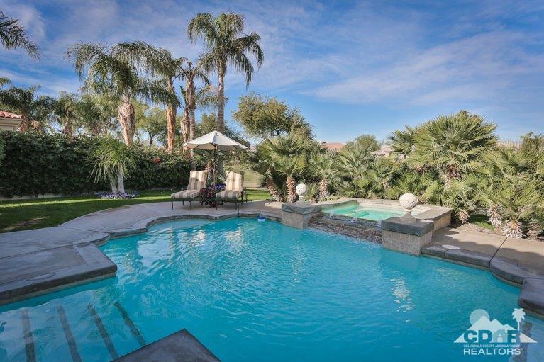 265 Loch Lomond Road Rancho Mirage, CA 92270 - Photo 33 of 46 a swimming pool with outdoor seating and yard