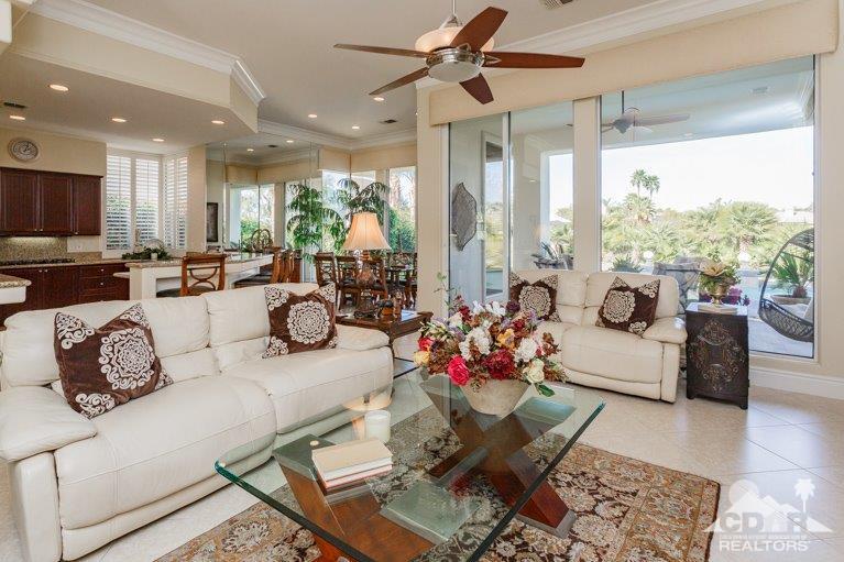 265 Loch Lomond Road Rancho Mirage, CA 92270 - Photo 5 of 46 a living room with furniture and a large window