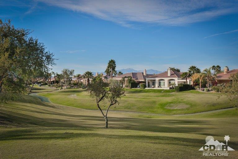 265 Loch Lomond Road Rancho Mirage, CA 92270 - Photo 43 of 46 a view of a lake with a big yard