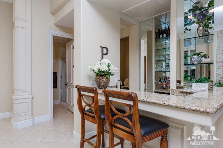 265 Loch Lomond Road Rancho Mirage, CA 92270 - Photo 9 of 46 a dining room with furniture and window