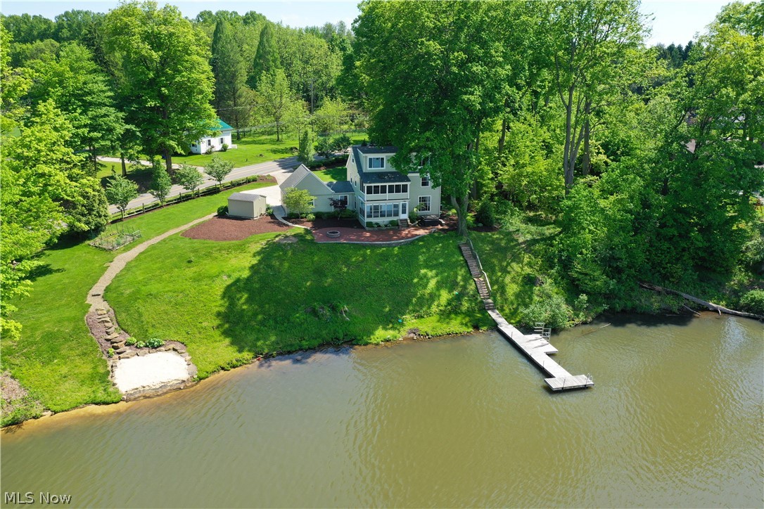7421 Diagonal Road Kent, OH 44240 - Photo 7 of 48 Aerial view featuring a water view showing dock and sandy beach