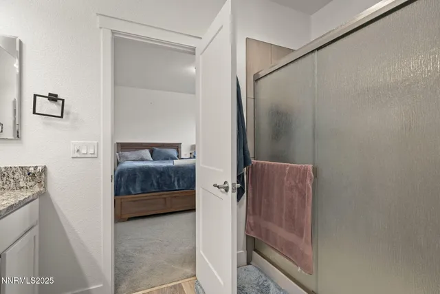 a bathroom with a tub and a sink