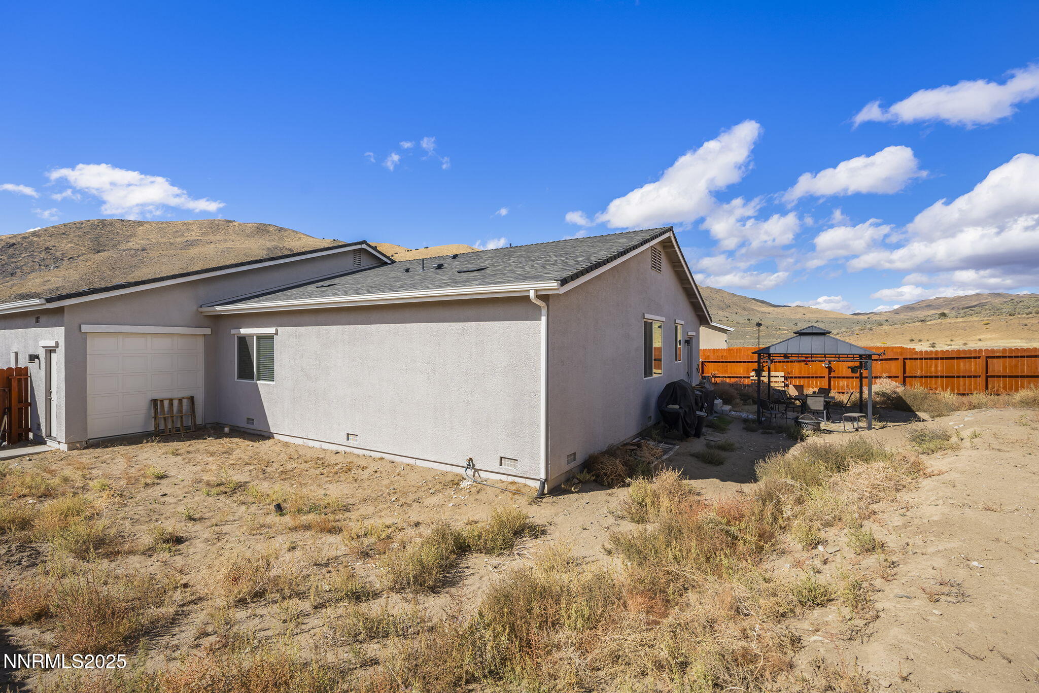 19064 Bronco Crk Court Reno, NV 89508 - Photo 20 of 20 a view of a house with a snow in the yard