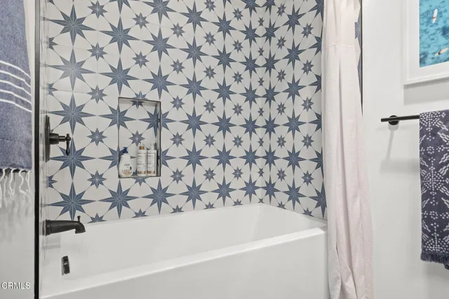 a bathroom with a bathtub