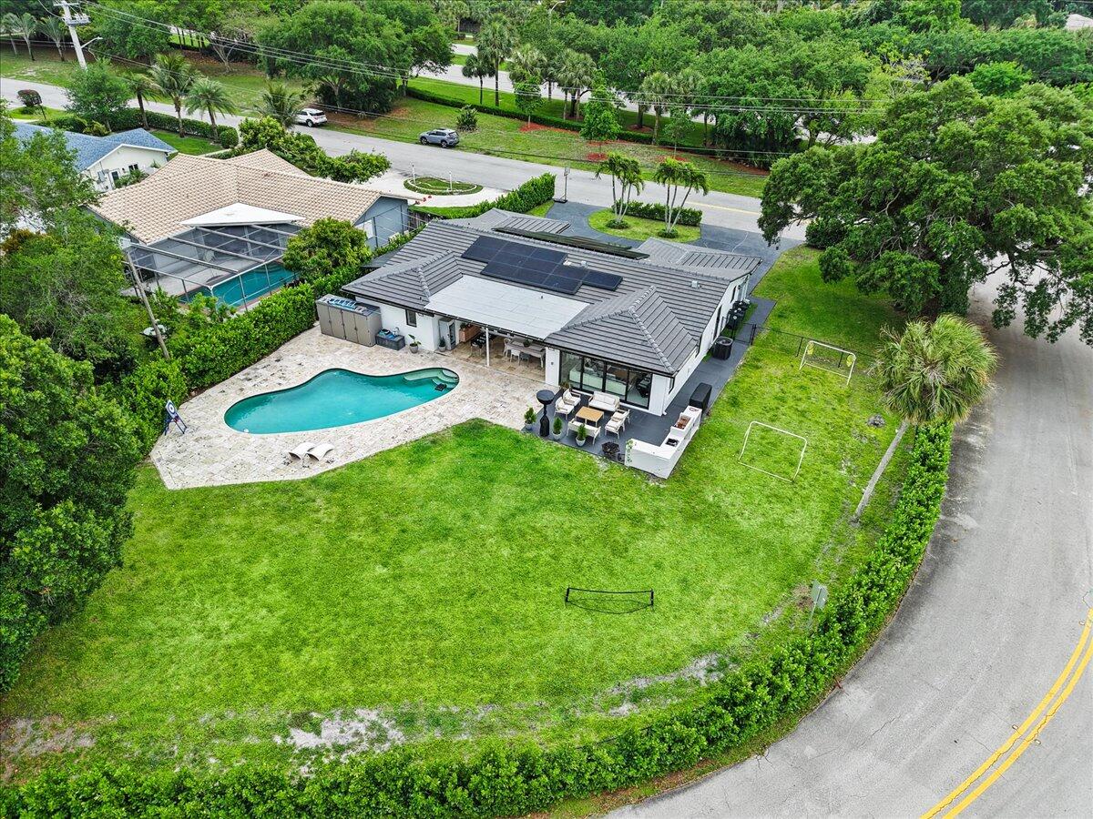 1049 West Palmetto Park Road Boca Raton, FL 33486 - Photo 37 of 40 an aerial view of a house with garden space and street view
