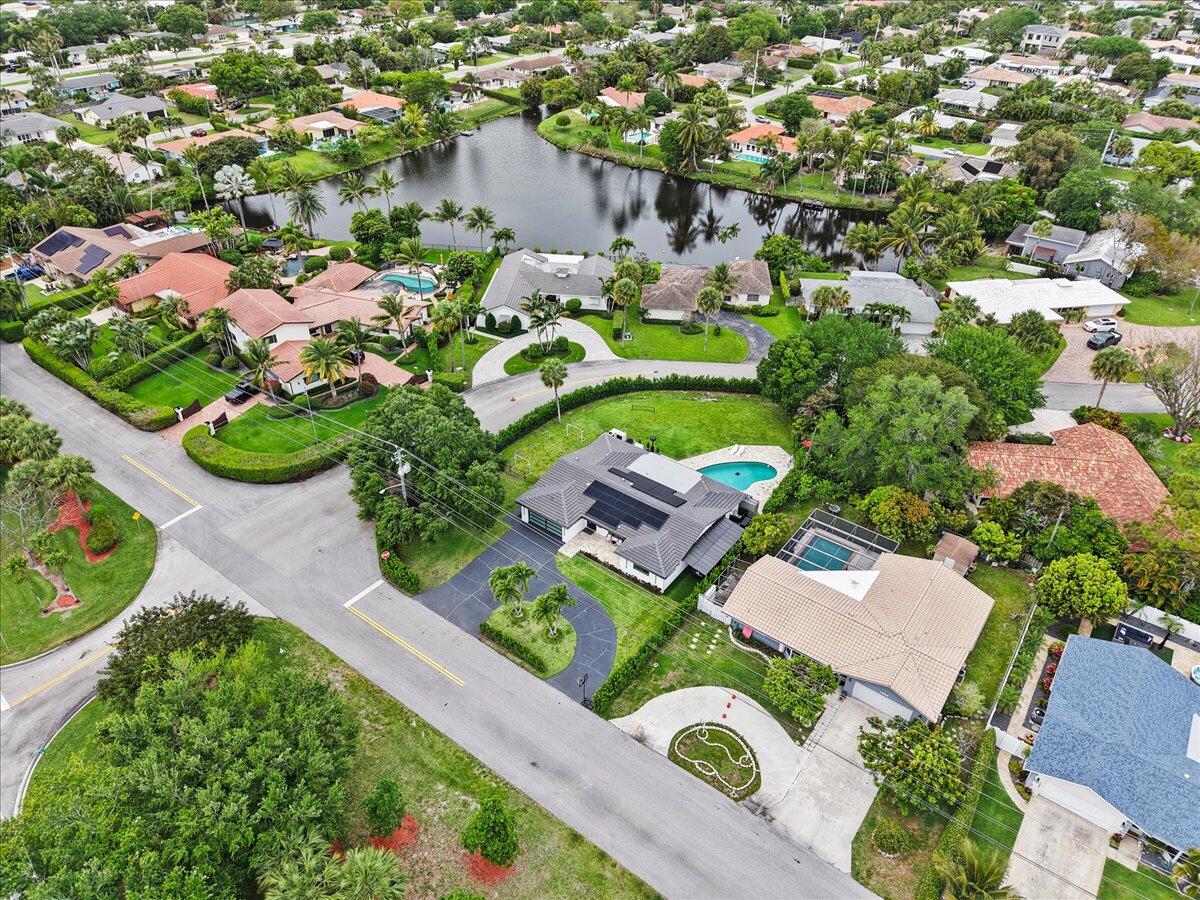 1049 West Palmetto Park Road Boca Raton, FL 33486 - Photo 39 of 40 an aerial view of a house with a garden