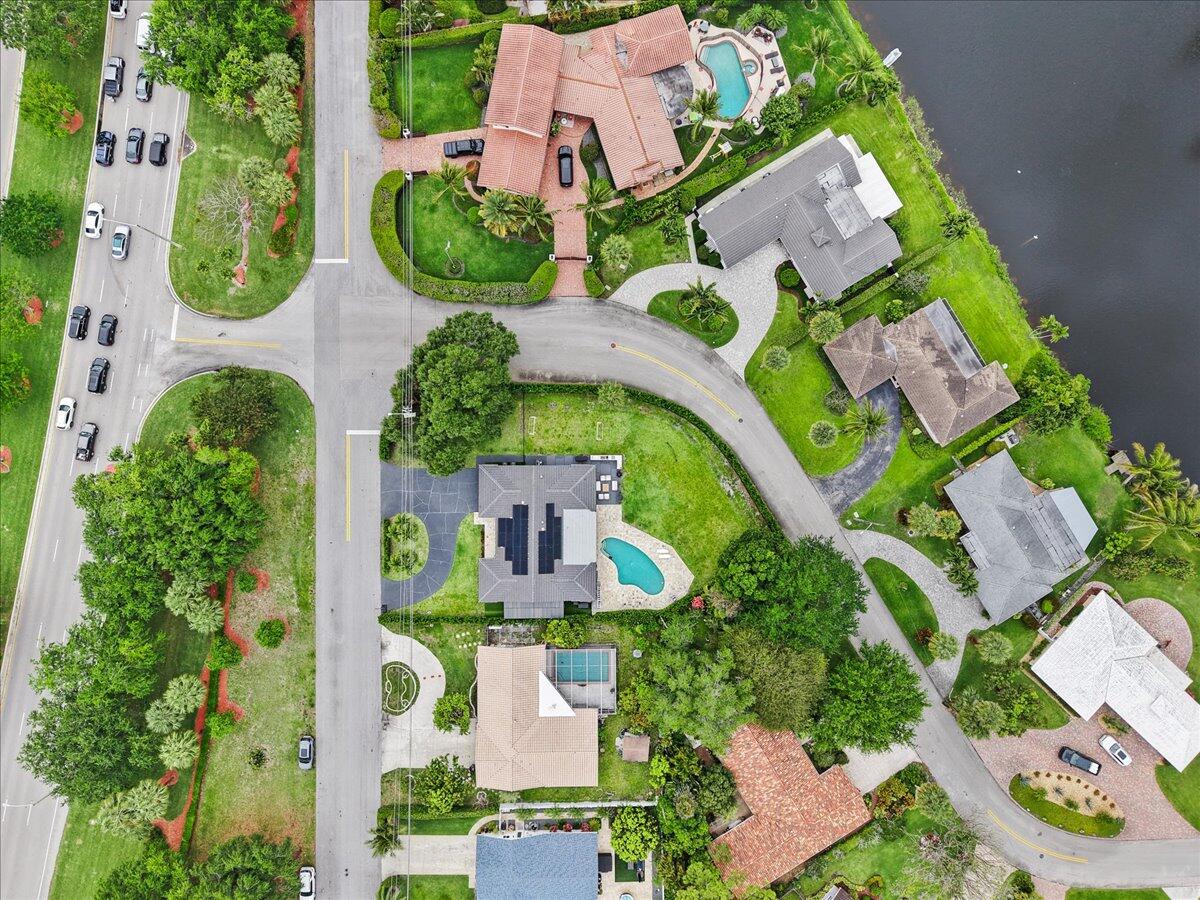 1049 West Palmetto Park Road Boca Raton, FL 33486 - Photo 40 of 40 an aerial view of a house with yard swimming pool and outdoor seating