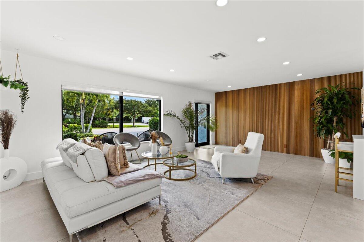 1049 West Palmetto Park Road Boca Raton, FL 33486 - Photo 6 of 40 a living room with furniture and a large window