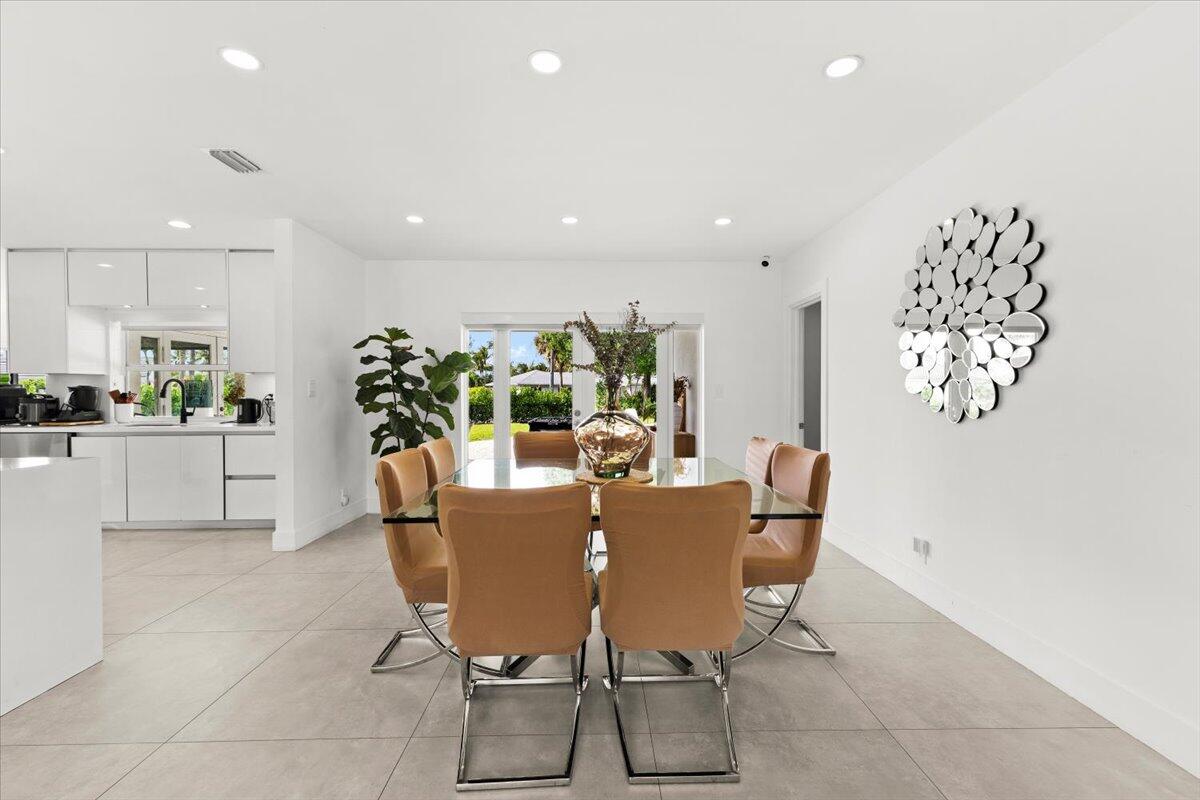 1049 West Palmetto Park Road Boca Raton, FL 33486 - Photo 8 of 40 a view of a dining room with furniture