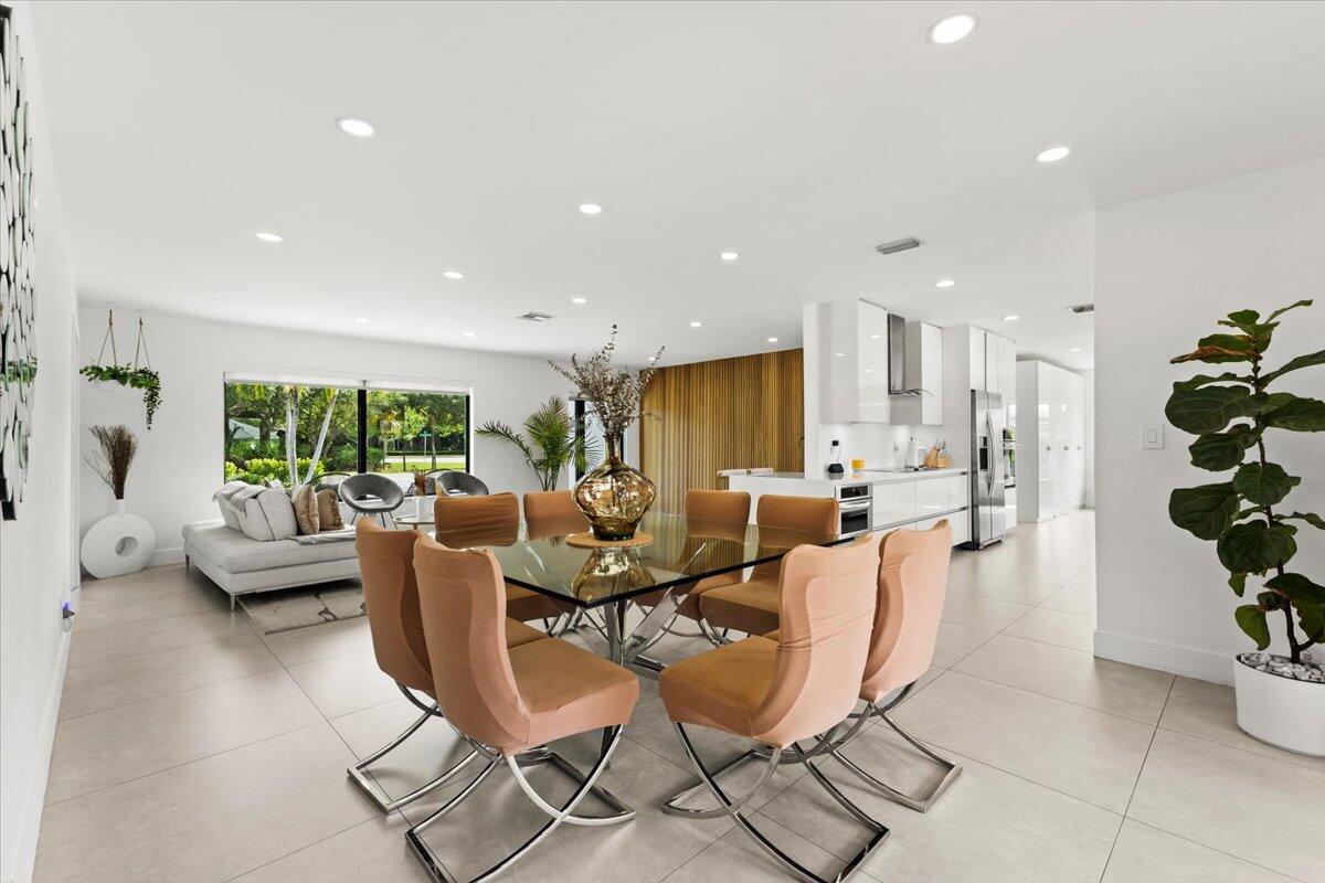 1049 West Palmetto Park Road Boca Raton, FL 33486 - Photo 9 of 40 a view of a dining room with furniture window and outside view