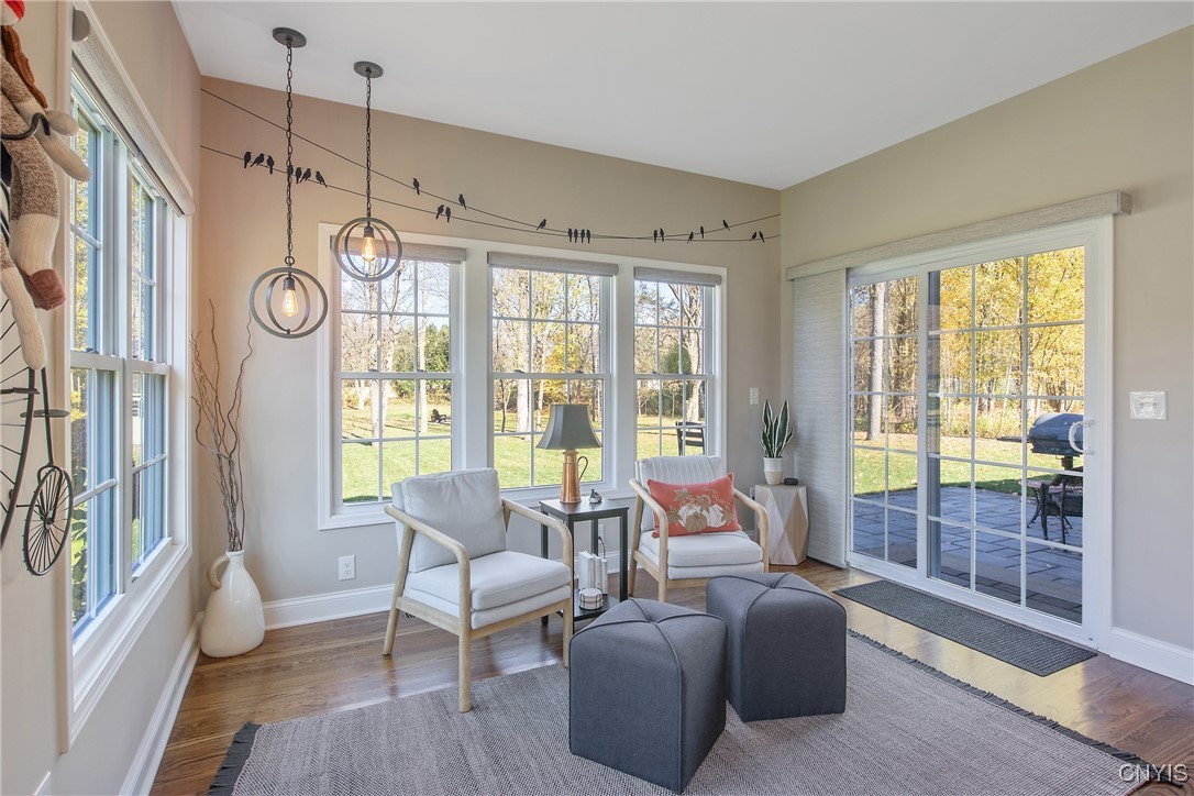 4304 Tiger Lily Path Clay, NY 13090 - Photo 14 of 50 Sitting area with custom blinds opens to the paver