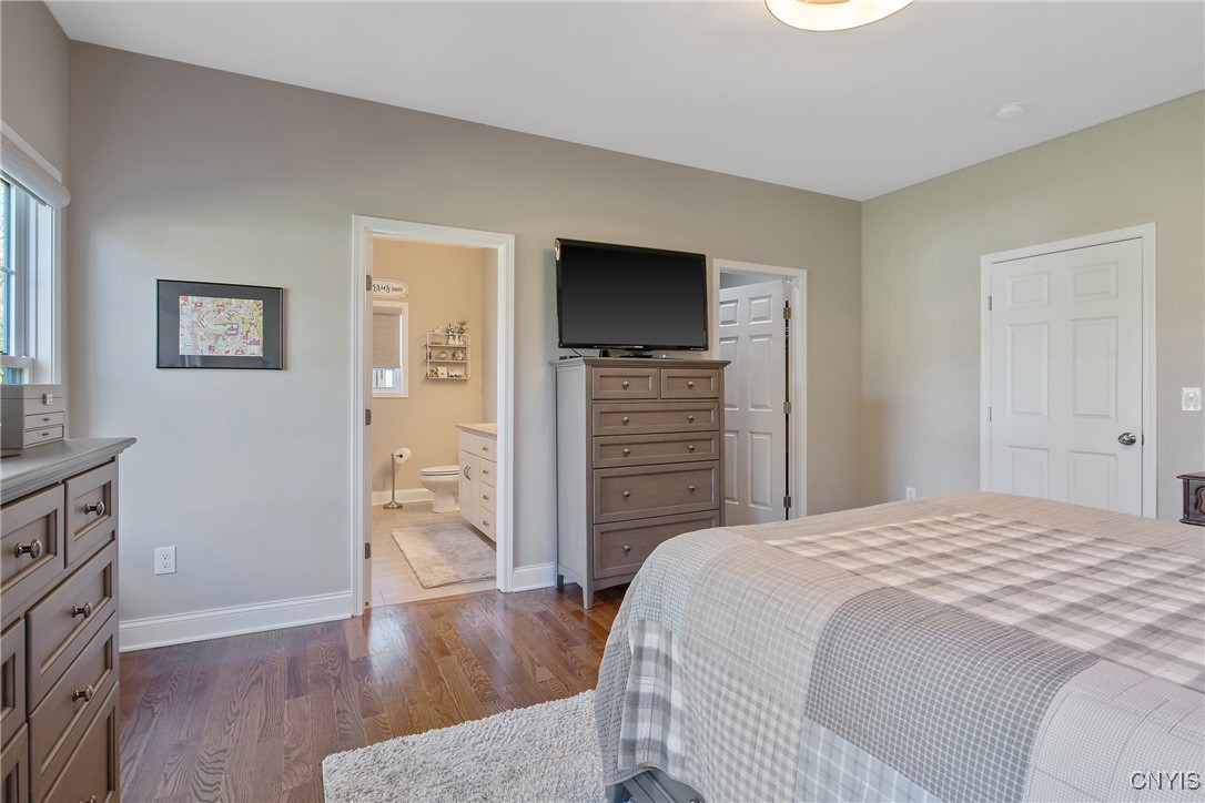 4304 Tiger Lily Path Clay, NY 13090 - Photo 17 of 50 Bedroom features a large walk in closet and luxuri