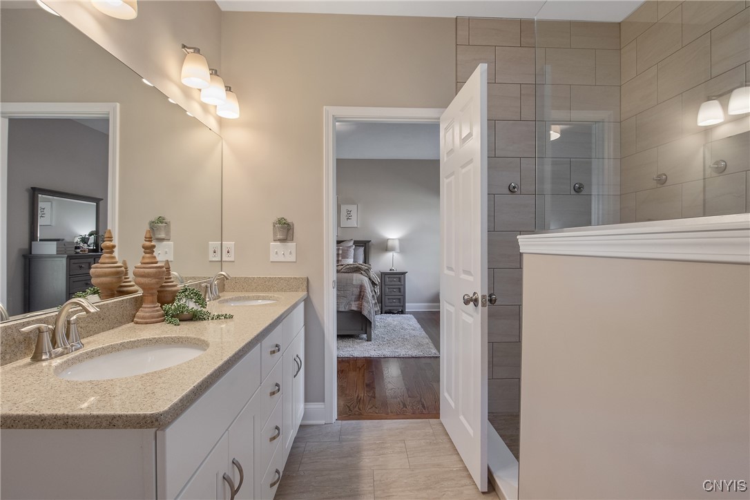 4304 Tiger Lily Path Clay, NY 13090 - Photo 18 of 50 Primary bath features double sinks