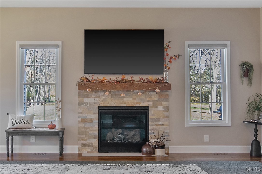 4304 Tiger Lily Path Clay, NY 13090 - Photo 6 of 50 Gas fireplace for cooler nights