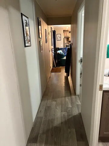 a bedroom with bed and window