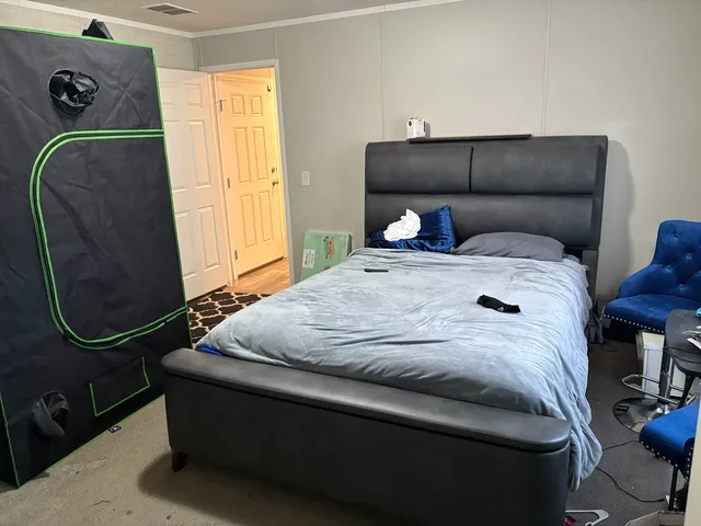 a bathroom with a sink vanity and toilet