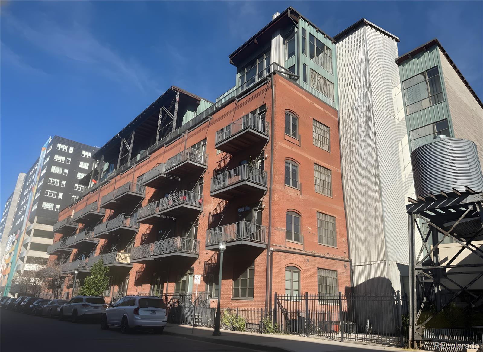 2960 Inca Street, Unit 417 Denver, CO 80202 - Photo 14 of 14 a view of a building with a street