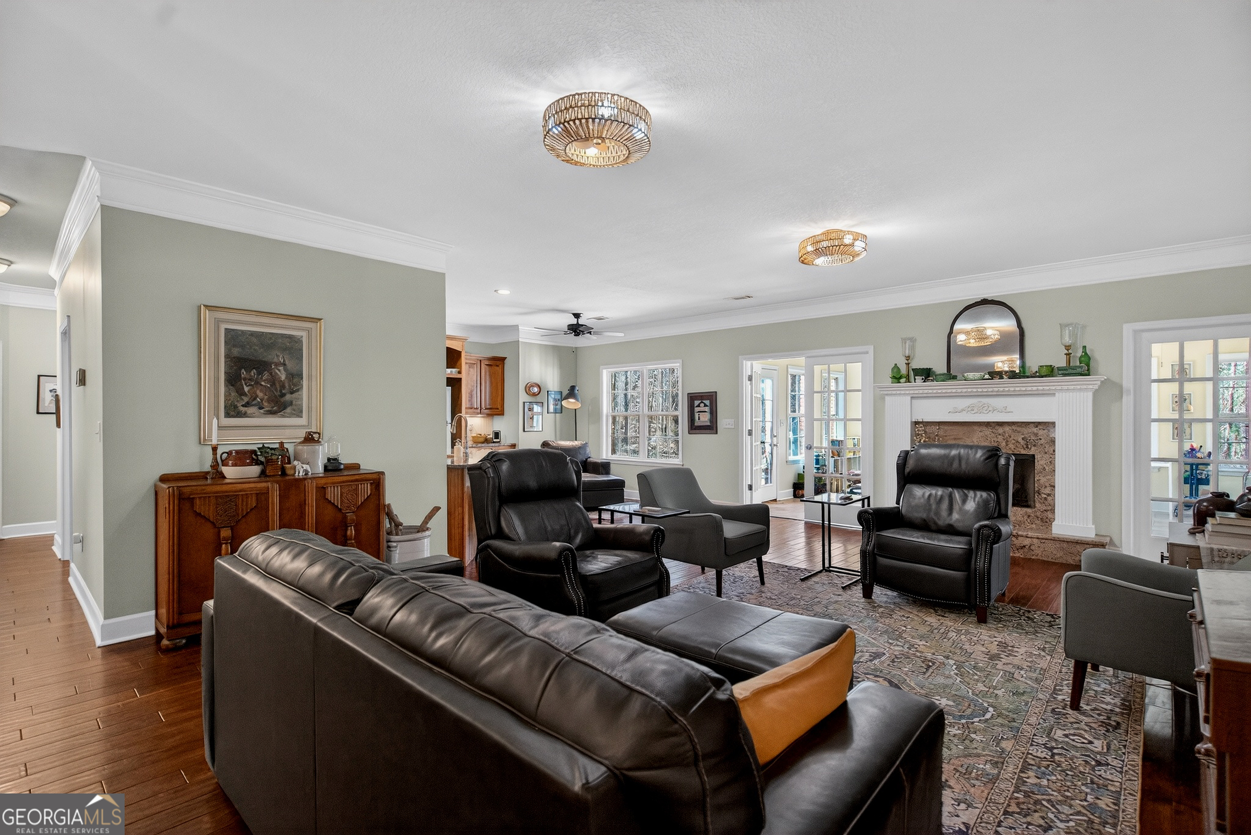 830 John Lovelace Road LaGrange, GA 30241 - Photo 12 of 45 a living room with furniture a fireplace and a flat screen tv