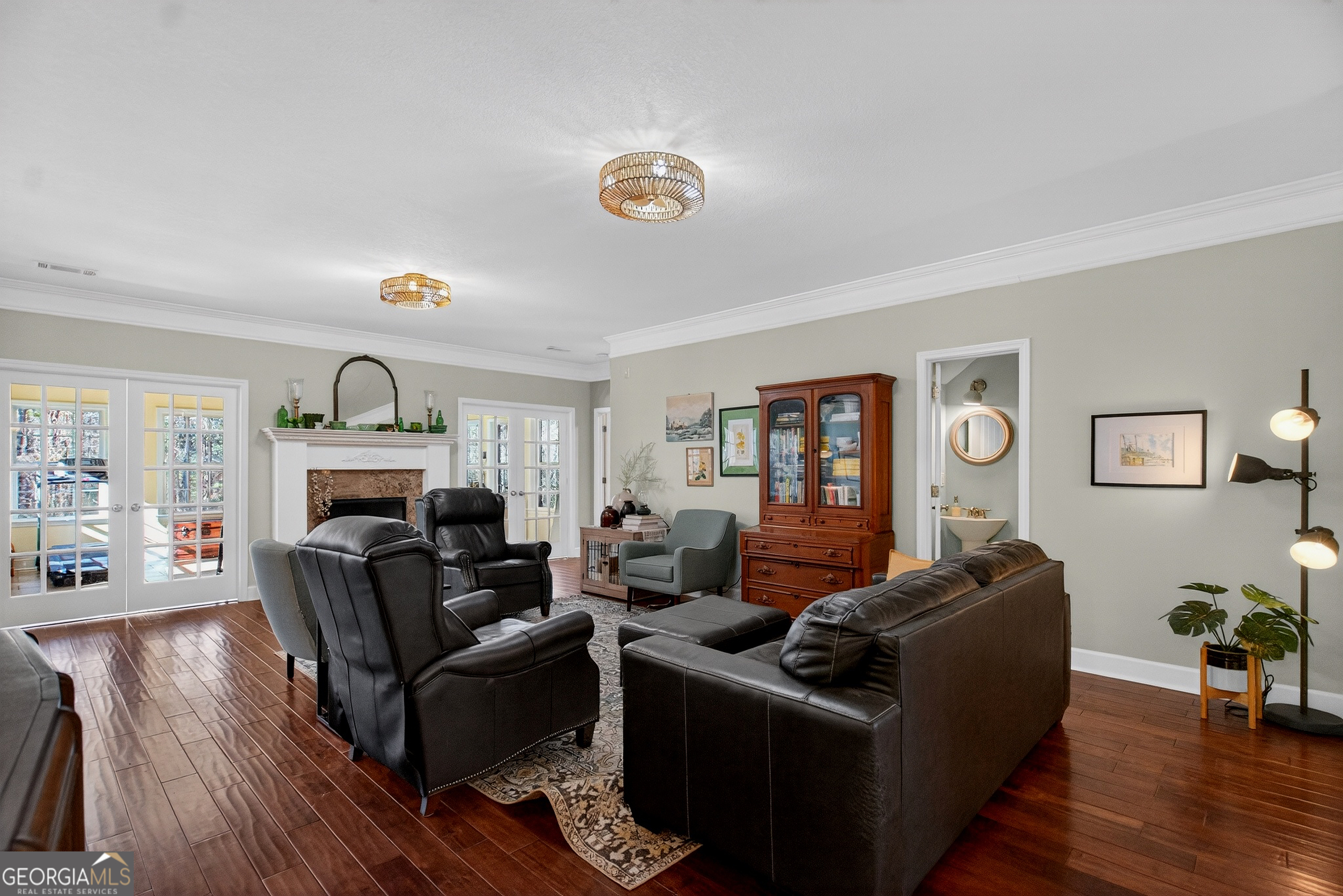 830 John Lovelace Road LaGrange, GA 30241 - Photo 13 of 45 a living room with furniture a fireplace and a window