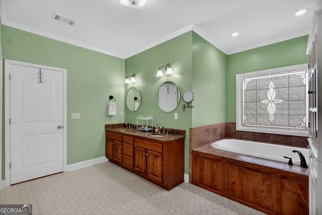 a living room with furniture and a clock