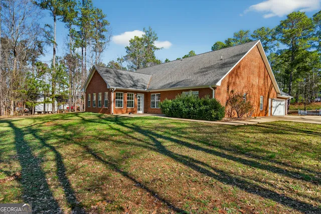 a view of a house with a big yard