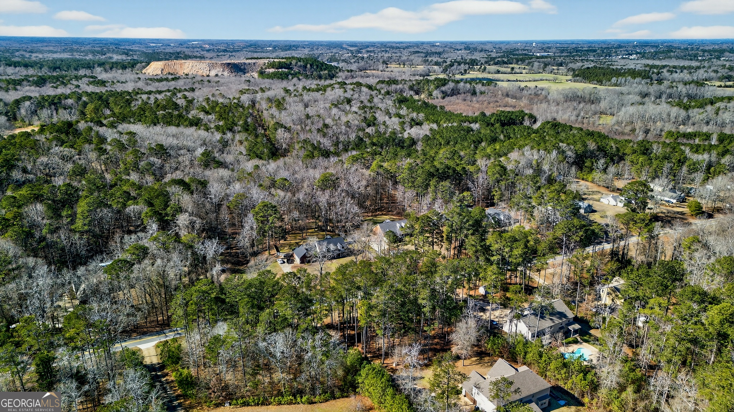 830 John Lovelace Road LaGrange, GA 30241 - Photo 43 of 45 a view of a city with lush green forest