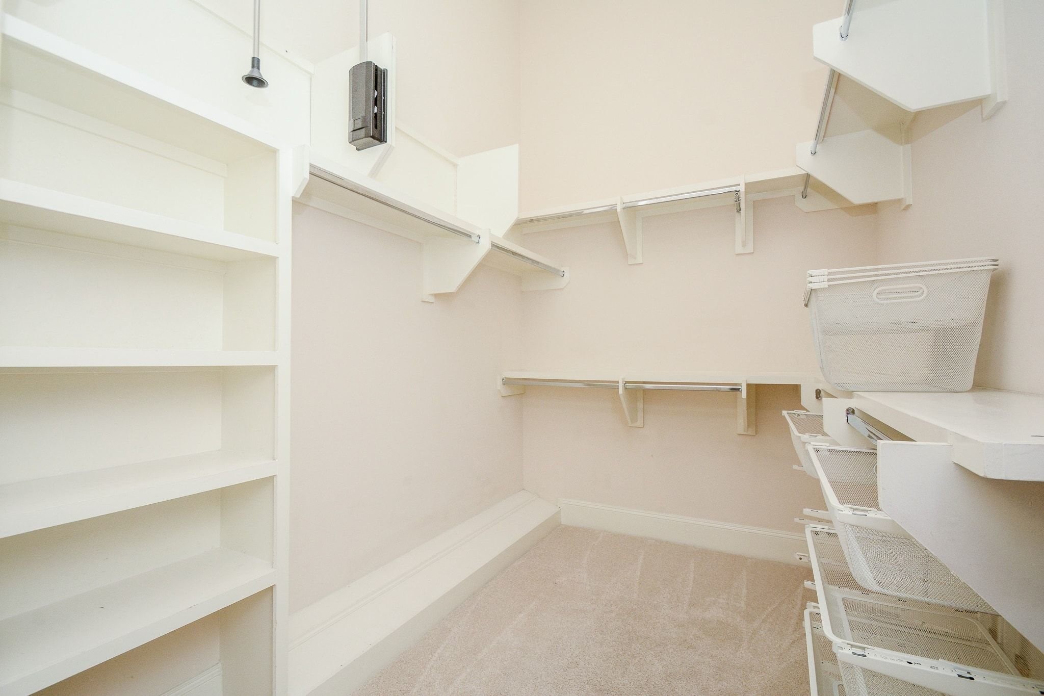 2960 Rusk Street Houston, TX 77003 - Photo 19 of 25 Primary walk in closet, built-in shelving.