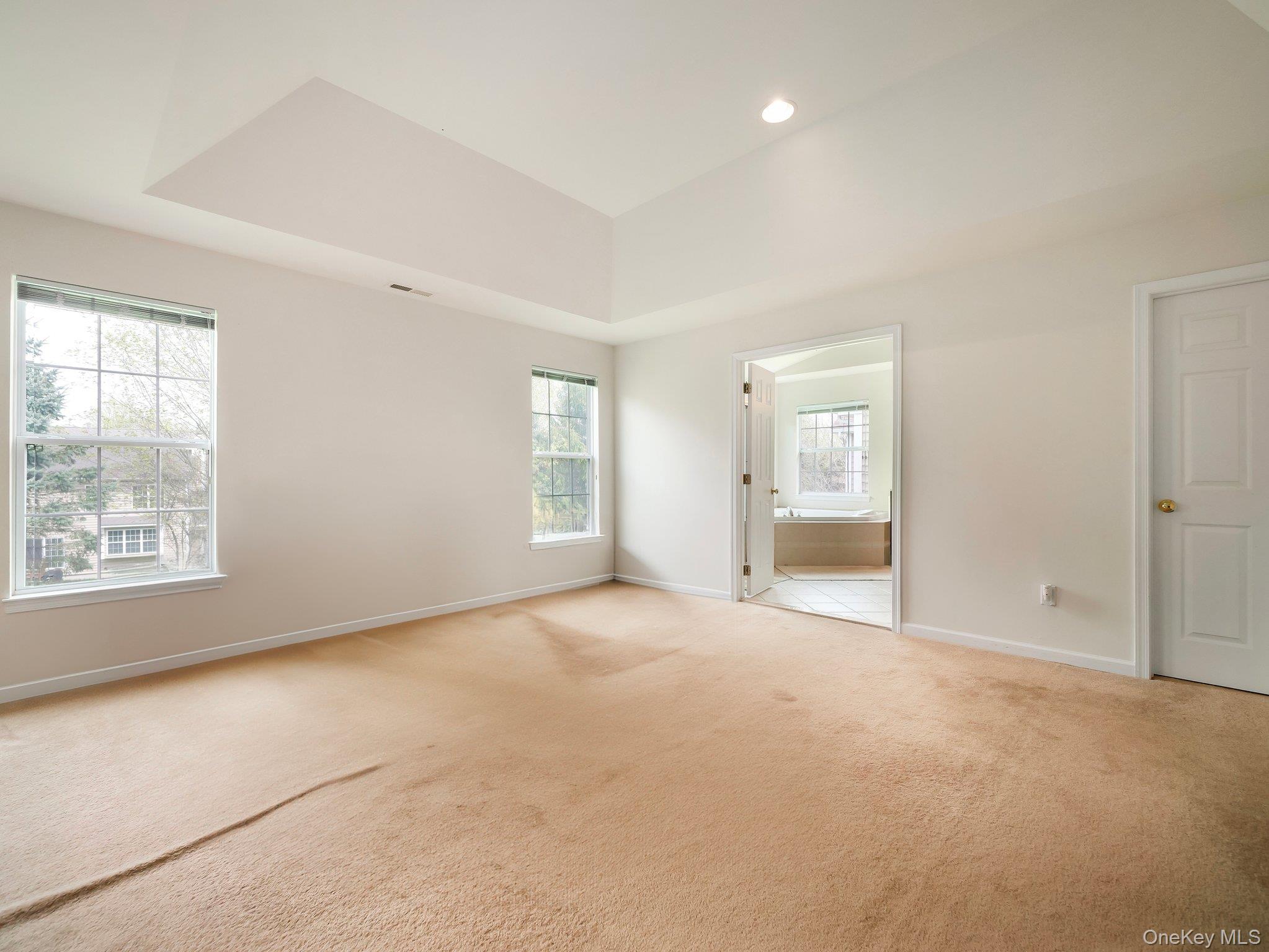 417 Vassar Place Fishkill, NY 12524 - Photo 21 of 38 an empty room with windows and closet